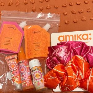 Amika Hair Care Collection with Pink and Orange Scrunchies
